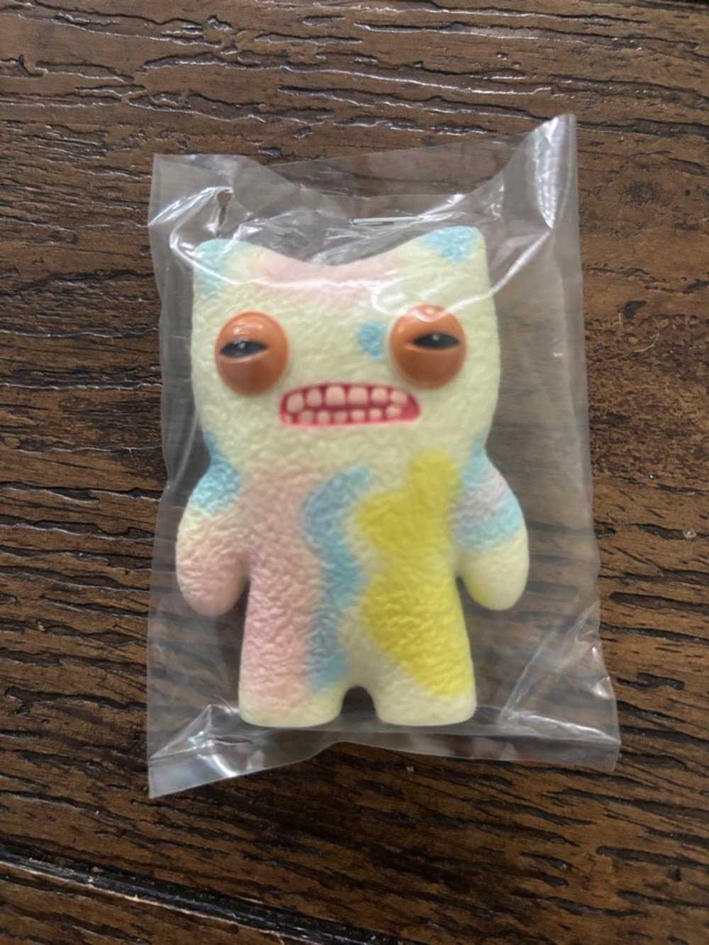 Pastel Swirl Vinyl Monster Figurine with Orange Eyes